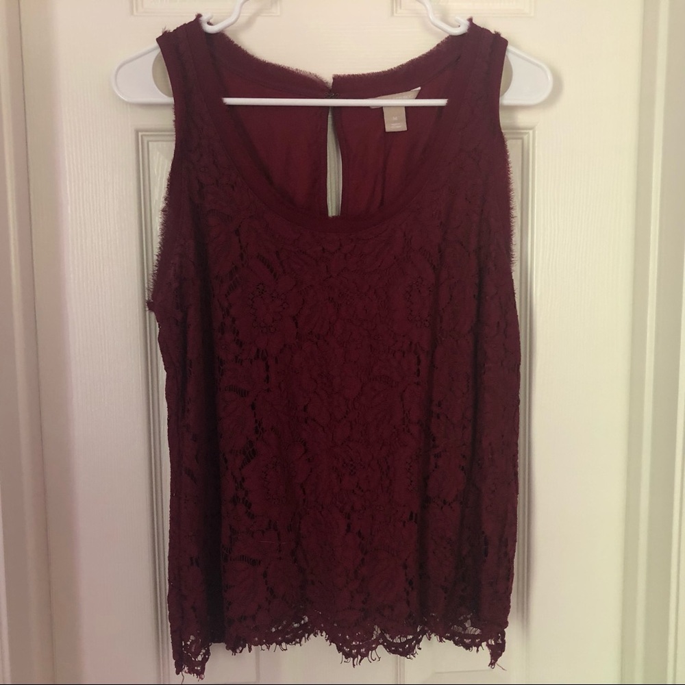 Red sleeveless top